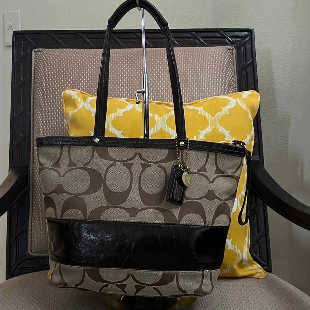 Coach signature stripe bag with large tag and charm very good condition